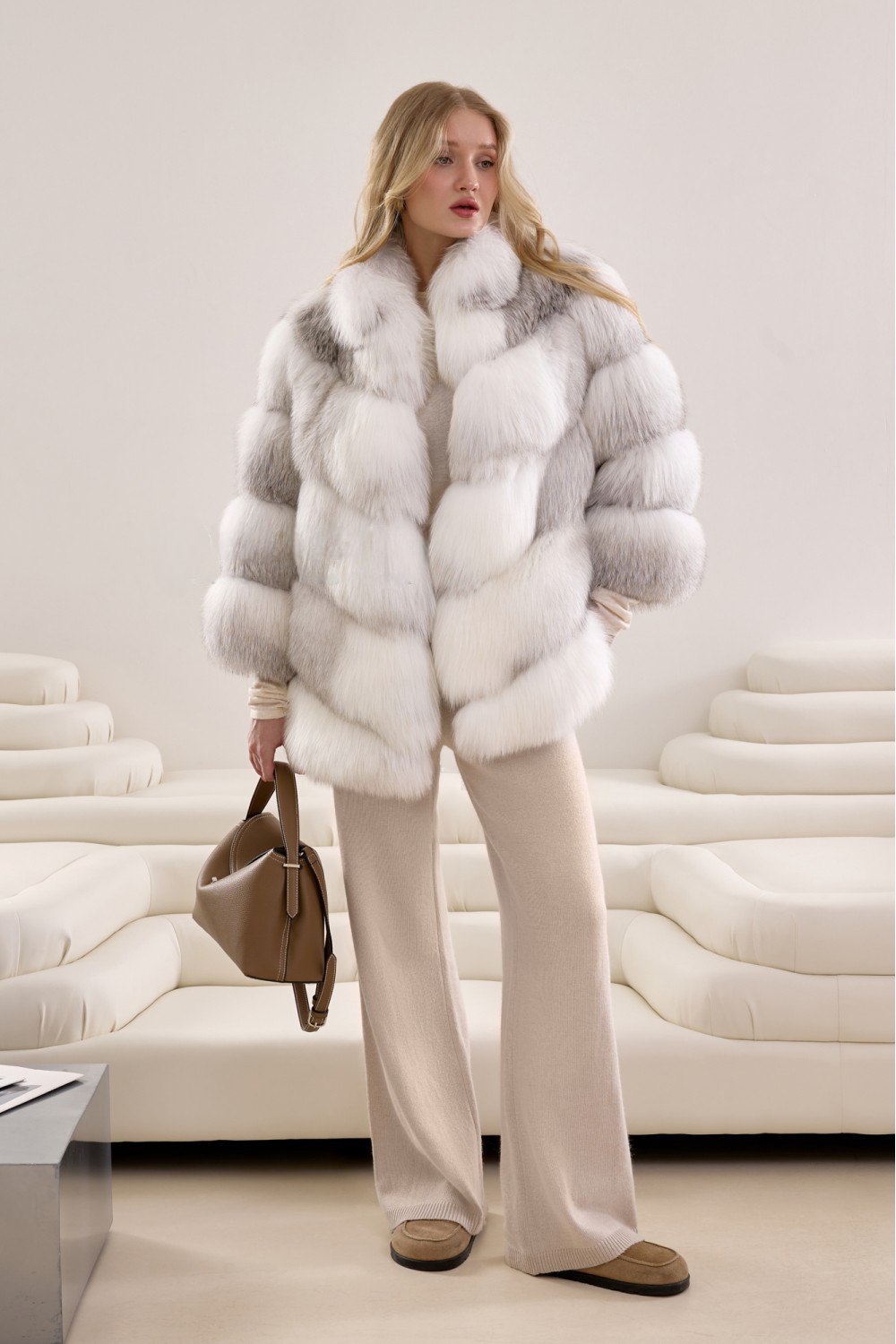 High-fashion Arctic Crossed fox fur coat with plush texture and generous volume, styled for maximum winter glamour.